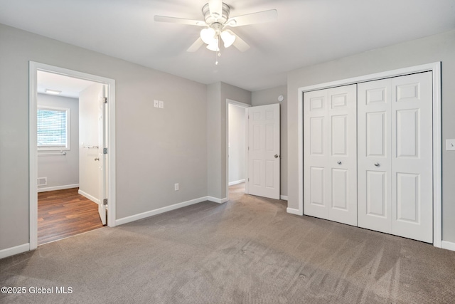 5 Heather Ln, Corinth, NY 12822 - unfurnished bedroom featuring carpet, a closet, ensuite bath, and ceiling fan