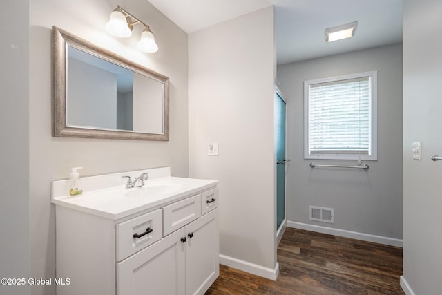 5 Heather Ln, Corinth, NY 12822 - bathroom with vanity, wood finished floors, and a stall shower