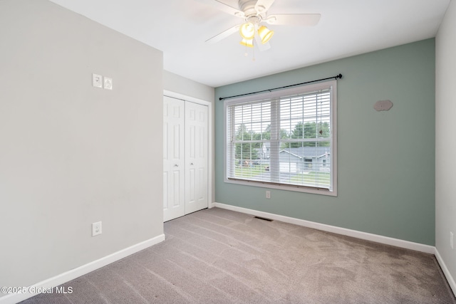 5 Heather Ln, Corinth, NY 12822 - unfurnished bedroom featuring carpet flooring, a closet, and ceiling fan