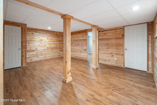 5 Heather Ln, Corinth, NY 12822 - finished basement with a drop ceiling, wood finished floors, wood walls, and recessed lighting