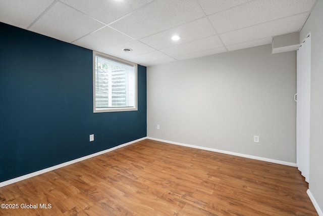 5 Heather Ln, Corinth, NY 12822 - spare room with wood finished floors and a drop ceiling