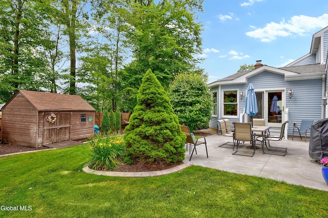 658 Salvia Ln, Guilderland, NY 12303 - view of grassy yard featuring a patio area and a storage shed