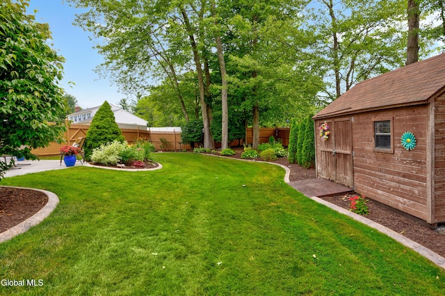 658 Salvia Ln, Guilderland, NY 12303 - fenced backyard with a storage unit