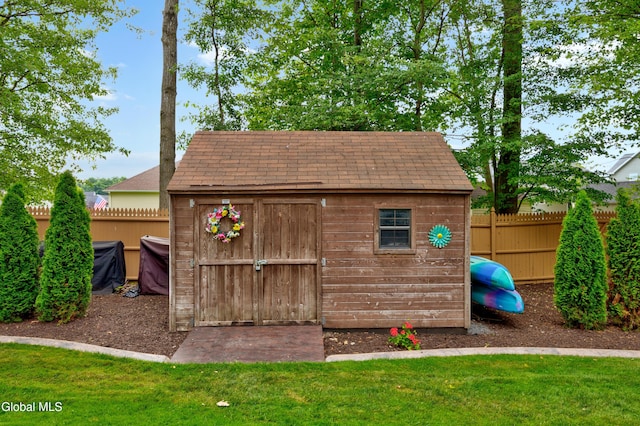 658 Salvia Ln, Guilderland, NY 12303 - view of shed with a fenced backyard