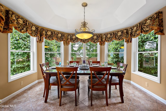 658 Salvia Ln, Guilderland, NY 12303 - dining space featuring a tray ceiling and light tile patterned floors