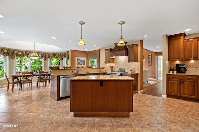 658 Salvia Ln, Guilderland, NY 12303 - kitchen with dishwasher, tasteful backsplash, a peninsula, a kitchen island, and gas range