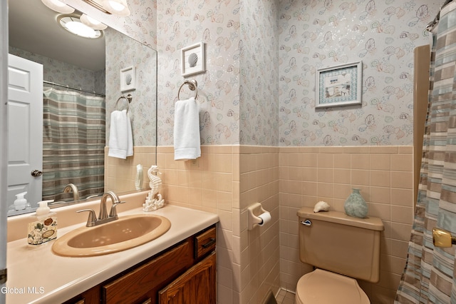 658 Salvia Ln, Guilderland, NY 12303 - full bathroom with tile walls, vanity, wainscoting, and wallpapered walls