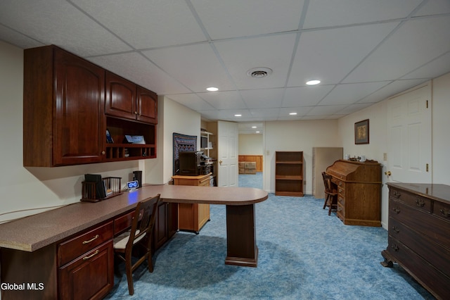 658 Salvia Ln, Guilderland, NY 12303 - home office with a drop ceiling, dark colored carpet, built in study area, and recessed lighting