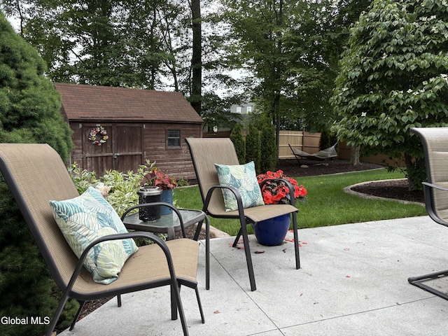 658 Salvia Ln, Guilderland, NY 12303 - view of patio featuring a storage unit
