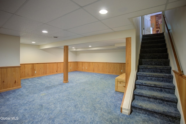 658 Salvia Ln, Guilderland, NY 12303 - finished basement featuring wainscoting, stairs, wooden walls, carpet flooring, and recessed lighting