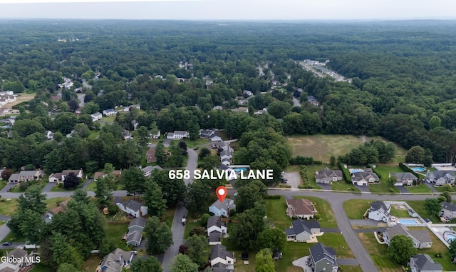 658 Salvia Ln, Guilderland, NY 12303 - aerial view of property and surrounding area featuring a forest and nearby suburban area