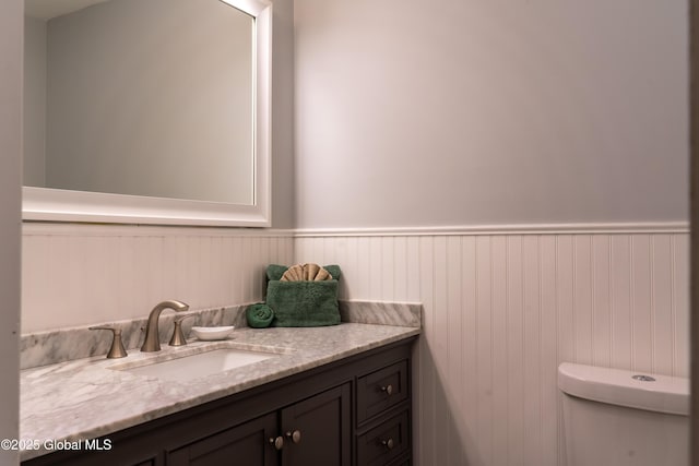 12 Heritage Ln, Clifton Park, NY 12065 - bathroom featuring vanity and a wainscoted wall