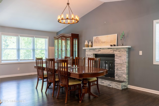 12 Heritage Ln, Clifton Park, NY 12065 - dining area with vaulted ceiling, a chandelier, wood finished floors, and a fireplace