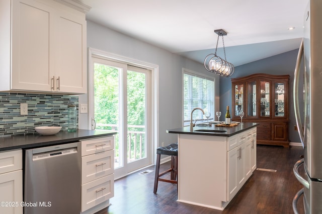 12 Heritage Ln, Clifton Park, NY 12065 - kitchen featuring appliances with stainless steel finishes, dark countertops, and plenty of natural light