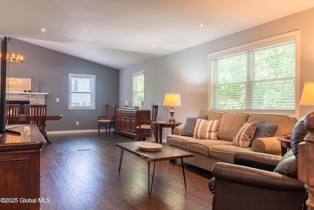 12 Heritage Ln, Clifton Park, NY 12065 - living area featuring dark wood-type flooring, lofted ceiling, a fireplace, recessed lighting, and a chandelier