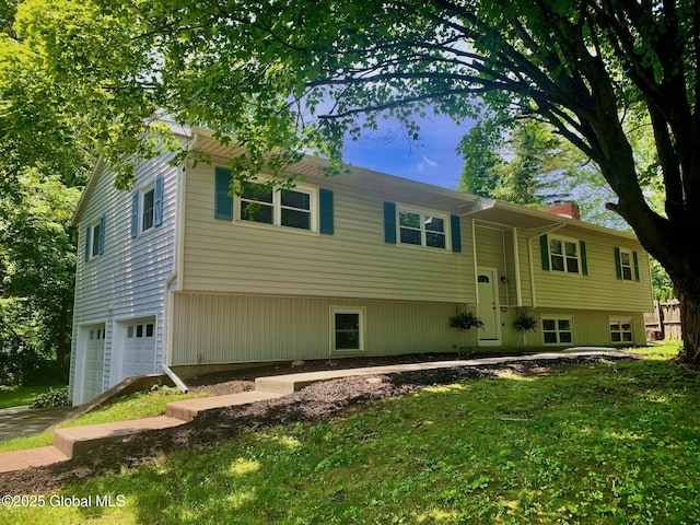12 Heritage Ln, Clifton Park, NY 12065 - view of front of property with a chimney and a garage