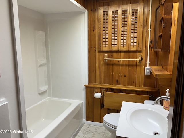 59 W St, Whitehall Village, NY 12887 - full bath with wooden walls, vanity, tile patterned floors, and shower / bath combination
