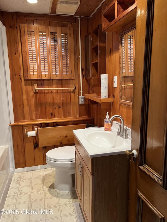 59 W St, Whitehall Village, NY 12887 - bathroom featuring tile patterned floors, wood walls, and vanity