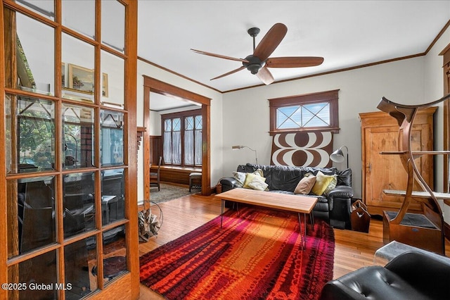1280 Dean St, Niskayuna, NY 12309 - living room with wood finished floors, ornamental molding, and ceiling fan