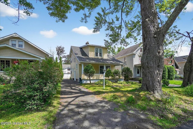 1280 Dean St, Niskayuna, NY 12309 - bungalow with a garage and a chimney