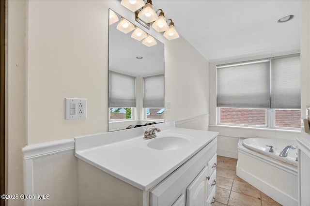 1280 Dean St, Niskayuna, NY 12309 - bathroom with vanity, a bath, and a wainscoted wall