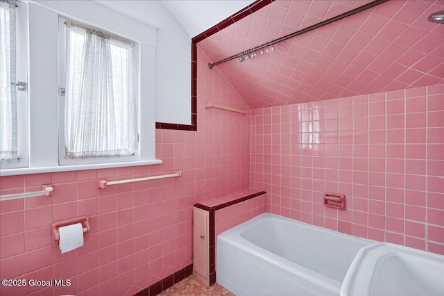 1280 Dean St, Niskayuna, NY 12309 - bathroom with vaulted ceiling and tile walls