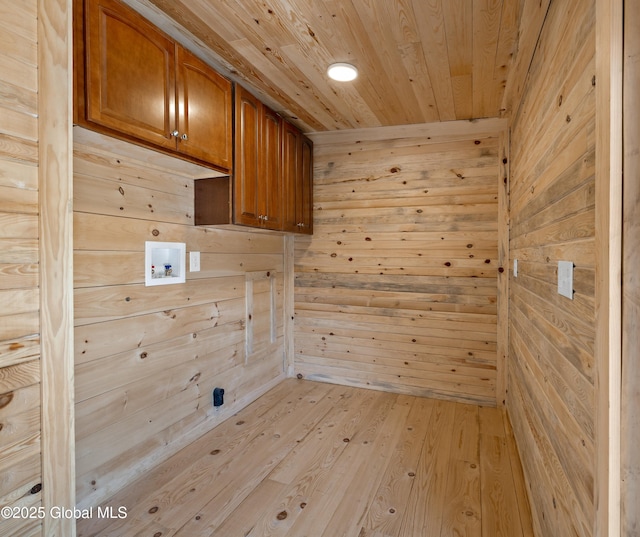 28 Gates Ave, Victory, NY 12871 - laundry room featuring cabinet space, washer hookup, wooden walls, wooden ceiling, and light wood-type flooring