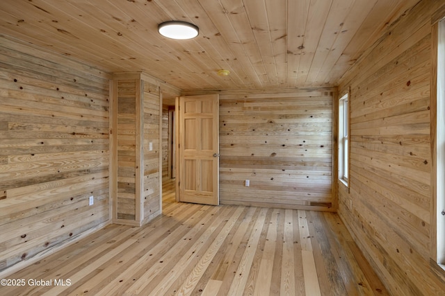 28 Gates Ave, Victory, NY 12871 - empty room featuring wood walls, light wood-style flooring, and wooden ceiling