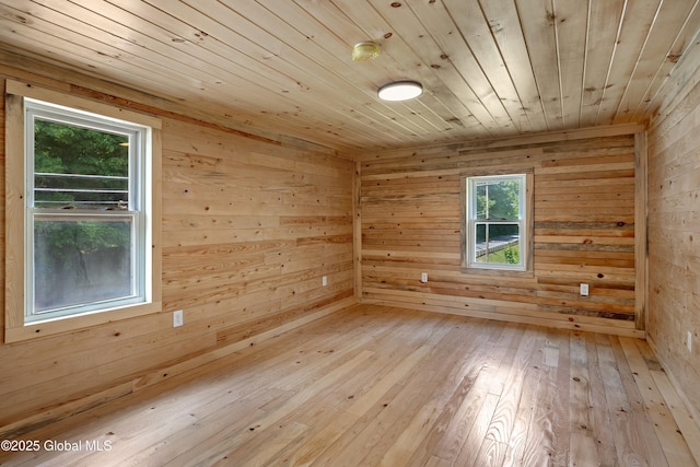 28 Gates Ave, Victory, NY 12871 - spare room featuring wood ceiling, wooden walls, and light wood-style flooring