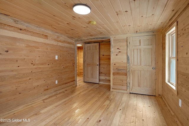 28 Gates Ave, Victory, NY 12871 - unfurnished room featuring wooden walls, light wood finished floors, and wooden ceiling