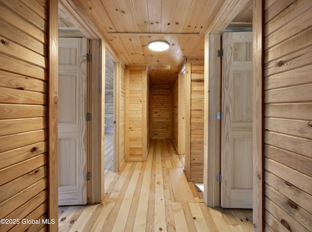 28 Gates Ave, Victory, NY 12871 - hall featuring light wood finished floors, wood ceiling, and wooden walls