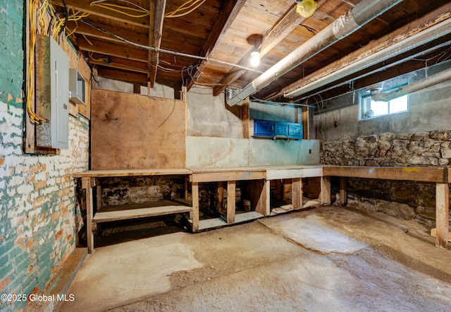 28 Gates Ave, Victory, NY 12871 - basement with electric panel and a workshop area