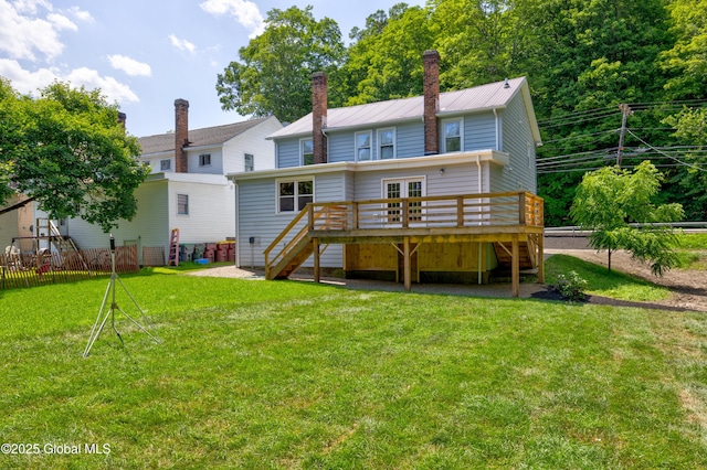 28 Gates Ave, Victory, NY 12871 - back of property featuring stairway, a deck, a metal roof, a standing seam roof, and a chimney