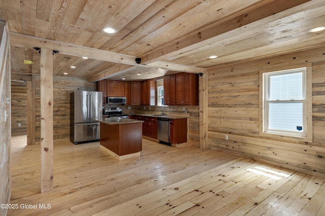 28 Gates Ave, Victory, NY 12871 - kitchen featuring stainless steel appliances, light wood-style flooring, a wooden ceiling with exposed beams, recessed lighting, and a center island