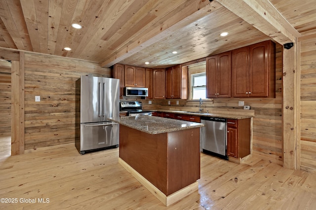 28 Gates Ave, Victory, NY 12871 - kitchen with stainless steel appliances, a wood ceiling with exposed beams, wood walls, recessed lighting, and light wood finished floors