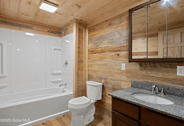 28 Gates Ave, Victory, NY 12871 - bathroom featuring wooden walls, vanity, shower / washtub combination, wooden ceiling, and wood finished floors