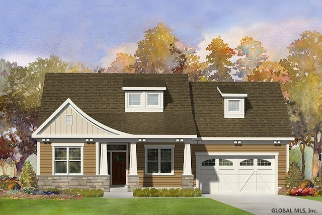 9 Admirals Way, Malta, NY 12020 - view of front of house with a lawn, stone siding, a shingled roof, concrete driveway, and board and batten siding