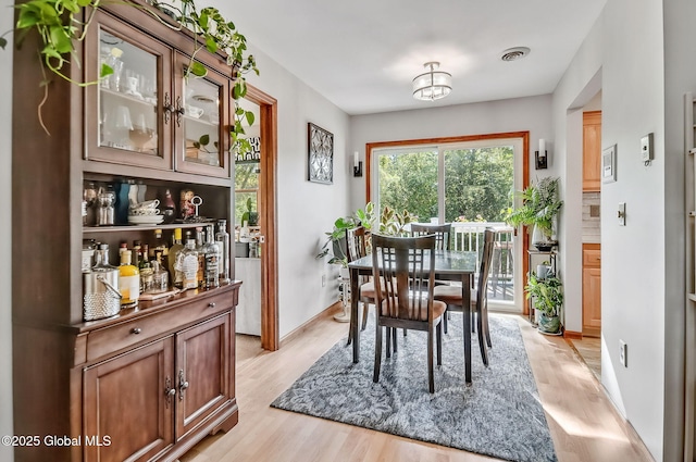 183 Cedarview Ln, Colonie, NY 12189 - dining room with light wood-style flooring and baseboards