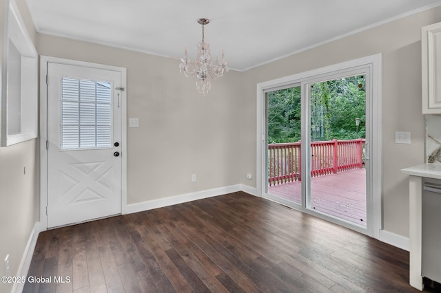 311 Old Loudon Rd, Colonie, NY 12110 - doorway with a chandelier, dark wood-style flooring, and ornamental molding