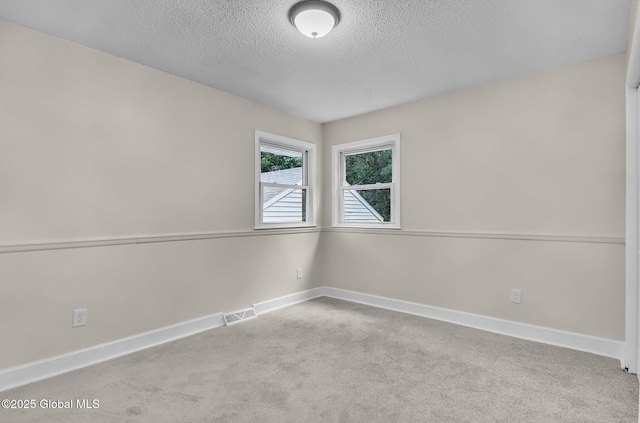311 Old Loudon Rd, Colonie, NY 12110 - unfurnished room with carpet flooring and a textured ceiling