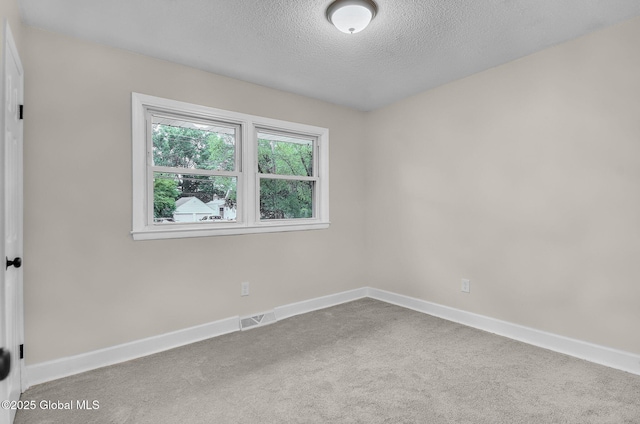 311 Old Loudon Rd, Colonie, NY 12110 - carpeted empty room featuring a textured ceiling and baseboards