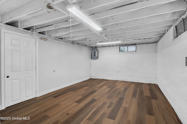 311 Old Loudon Rd, Colonie, NY 12110 - basement featuring electric panel and dark wood-type flooring