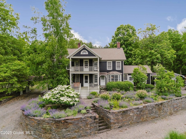 88 Mac Brown Rd, Claverack, NY 12513 - greek revival house with covered porch, a balcony, and a chimney