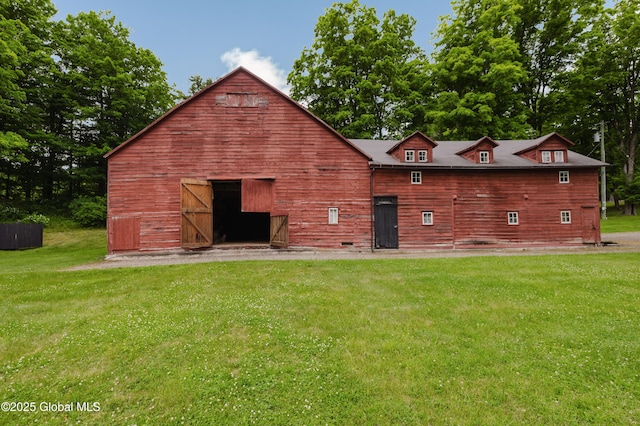 88 Mac Brown Rd, Claverack, NY 12513 - back of property featuring a barn, a yard, and an outbuilding