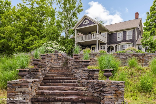 88 Mac Brown Rd, Claverack, NY 12513 - view of front of house with a balcony and a chimney