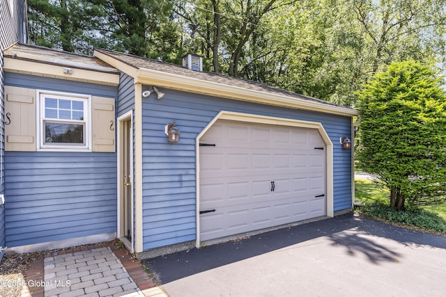 2 Eddy Ln, East Greenbush, NY 12144 - garage with asphalt driveway