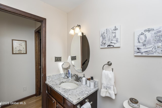 2 Eddy Ln, East Greenbush, NY 12144 - bathroom featuring vanity and wood finished floors