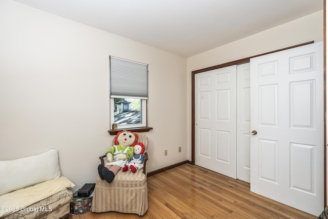 2 Eddy Ln, East Greenbush, NY 12144 - sitting room with wood-type flooring and baseboards