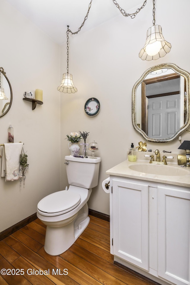 2 Eddy Ln, East Greenbush, NY 12144 - half bathroom featuring wood finished floors and vanity