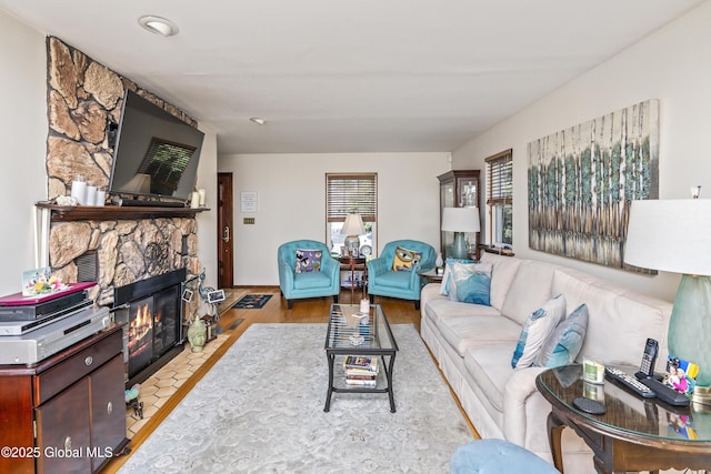 2 Eddy Ln, East Greenbush, NY 12144 - living area featuring a fireplace and wood finished floors